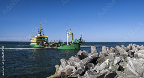 Dredger on duty on baltic sea in Poland