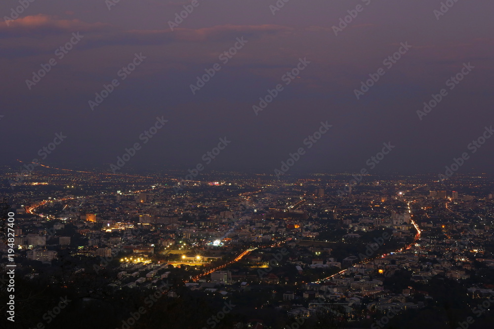 Chiang Mai city view at evening with sunbeam area highlight background, Thailand concept