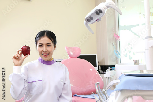 Handsome dentist conversation patient open mouth during oral checkup with mirror near by, Trust in medicine treatment professional doctor explain for good healthcare in clinic dental office room unit