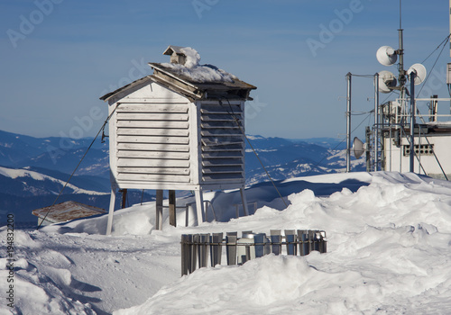 weather station in winter mountain landscape. Romania