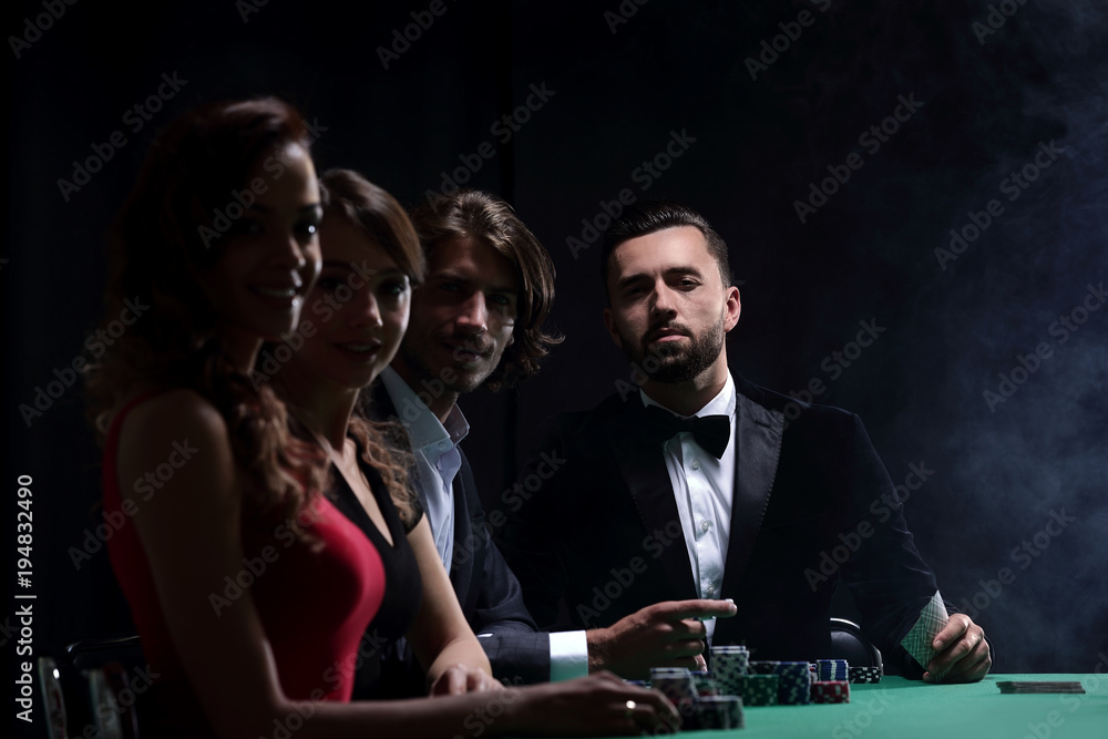 Men and woman talking at craps game in casino Men and woman talking at craps game in casino