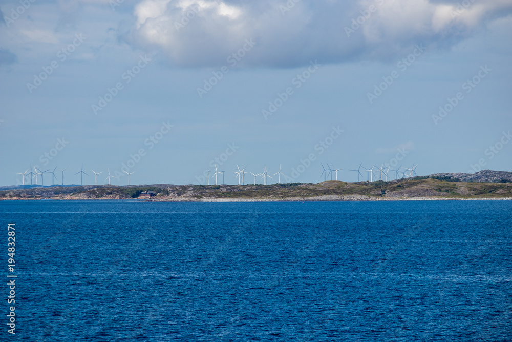 Windmill farm on the island of Smola in Norway. Smola Wind Farm is a 68 turbine wind farm located in Smola Municipality in More og Romsdal county, Norway. 
