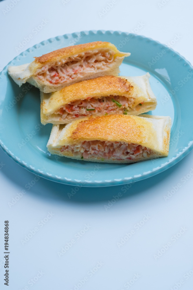 close up Home Made Grilled Crab Stick and Ebiko Sandwiches.(selective Focus) close up Home Made Grilled Crab Stick and Ebiko Sandwiches.(selective Focus)