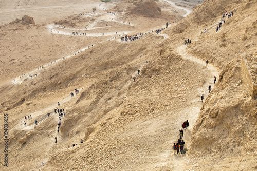 A  tourists returning from the  Masada on the snake path in the Judean Desert