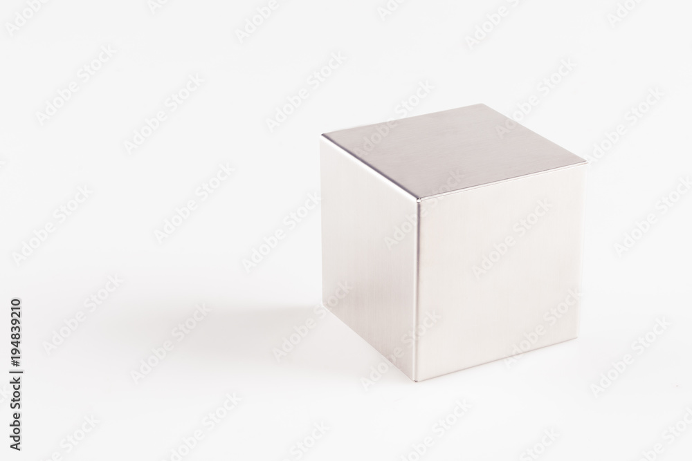 Metal grey cube on a white background ,abstract geometric shape Metal grey cube on a white background ,abstract geometric shape