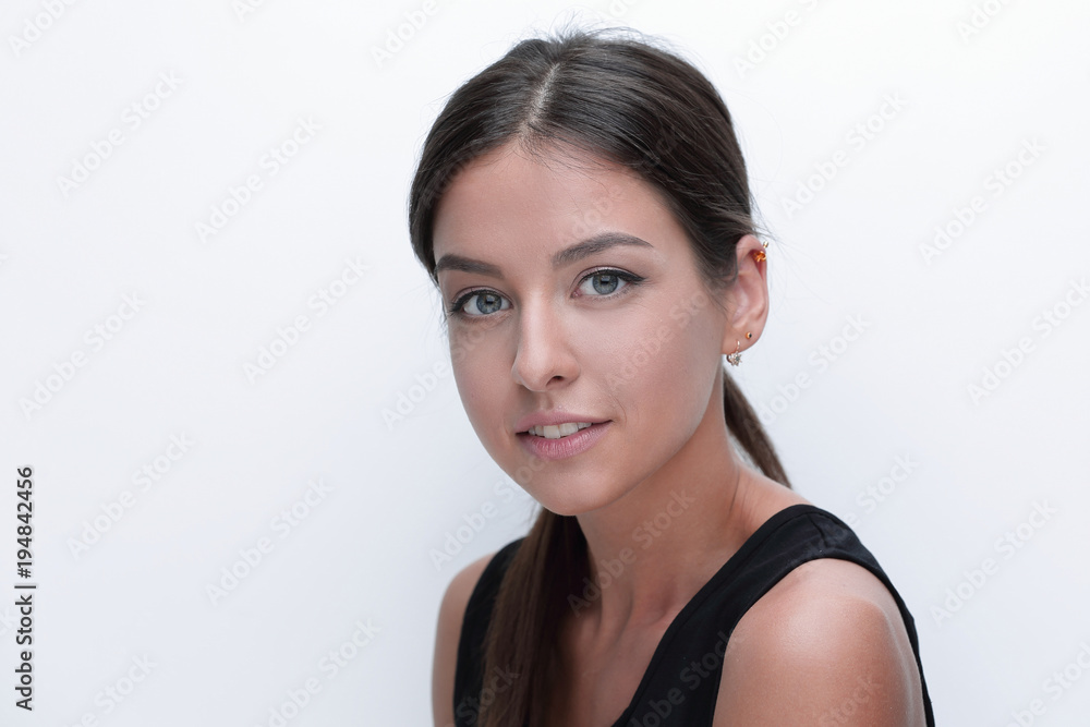 Portrait of a cute young woman. The concept of youth and skin care. Portrait of a cute young woman. The concept of youth and skin care.