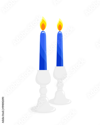 Two candlesticks with candles