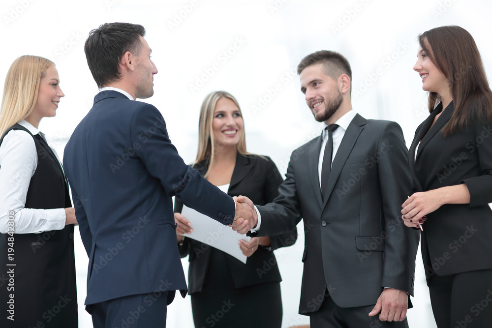 business team handshake and business partners business team handshake and business partners