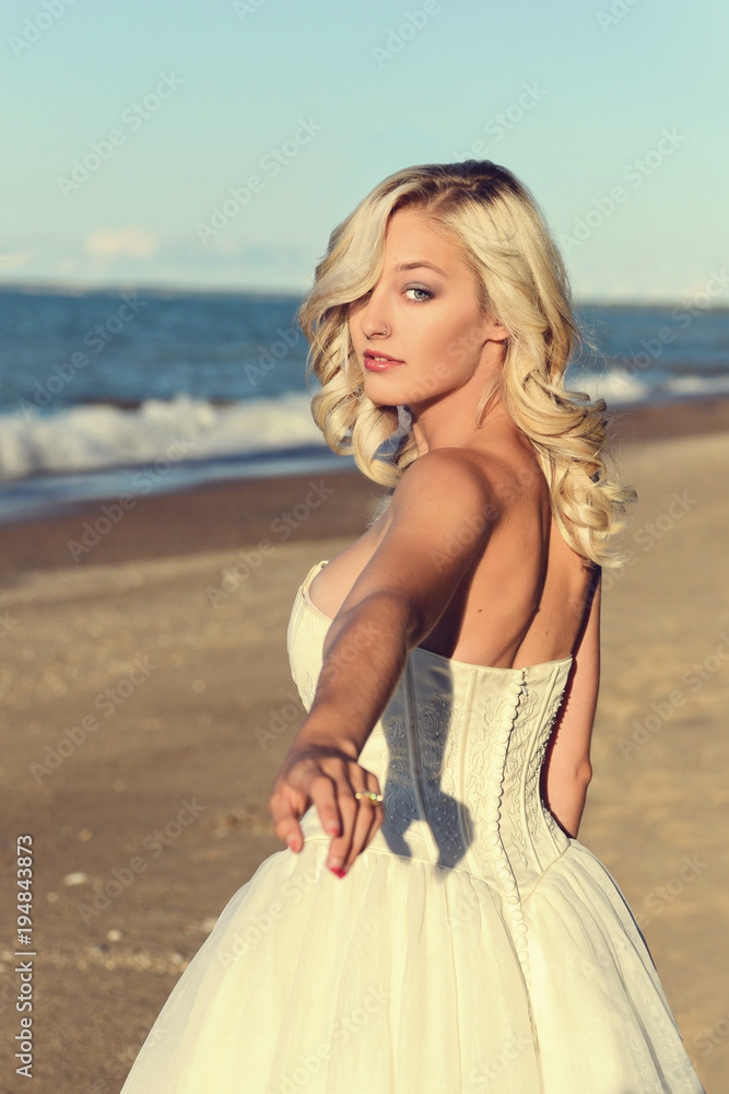blonde woman in white dress follow me on beach blonde woman in white dress follow me on beach