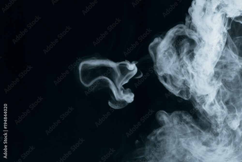 Texture of white smoke on a black background Texture of white smoke on a black background