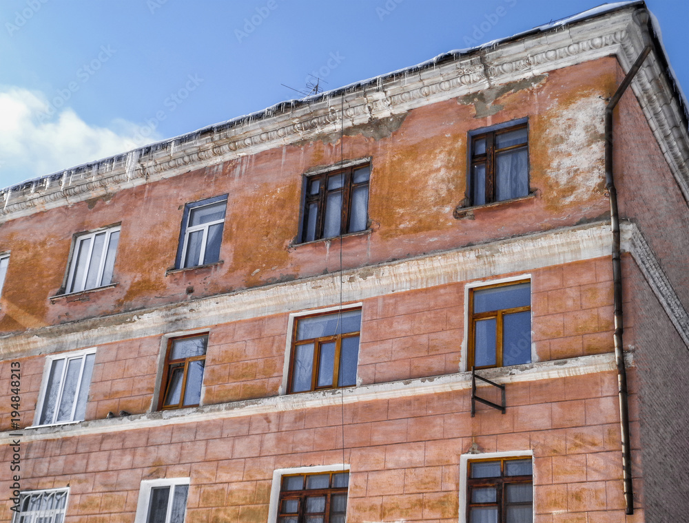 Old apartment building. Building fragment. Old architecture. Old town