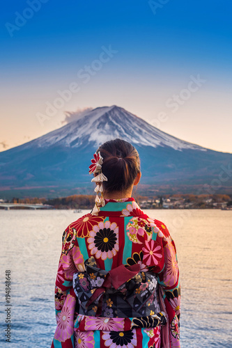 Photography Asian woman wearing japanese traditional kimono at Fuji mountain