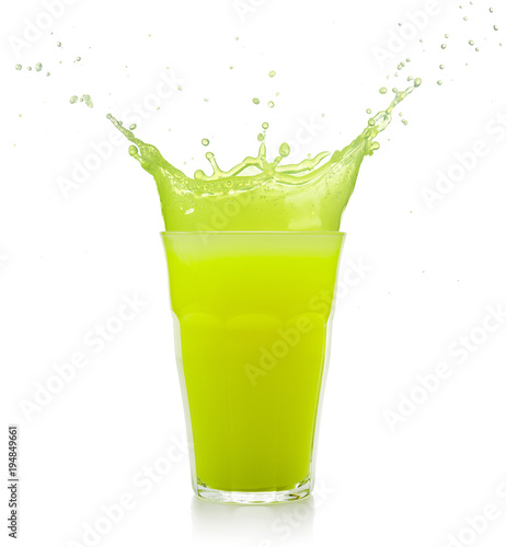green juice glass splashing isolated on white
