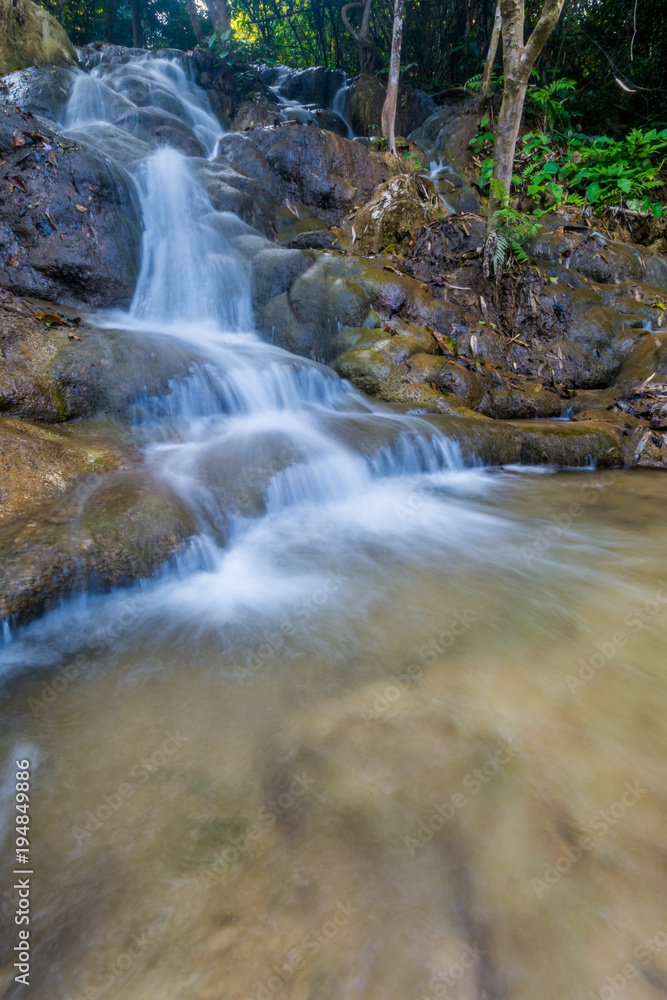 Pu Kang waterfall in the forest Chiang Rai province Thailand.