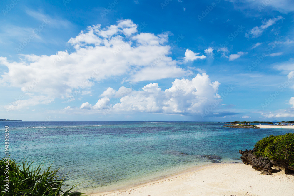 Landscape view of blue sky and white clouds over summer beach at Okinawa, Japan