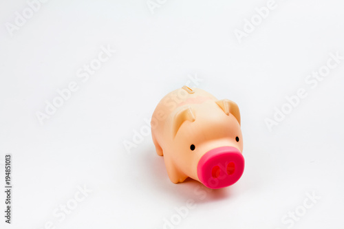 Isolated plastic piggy bank on A white.