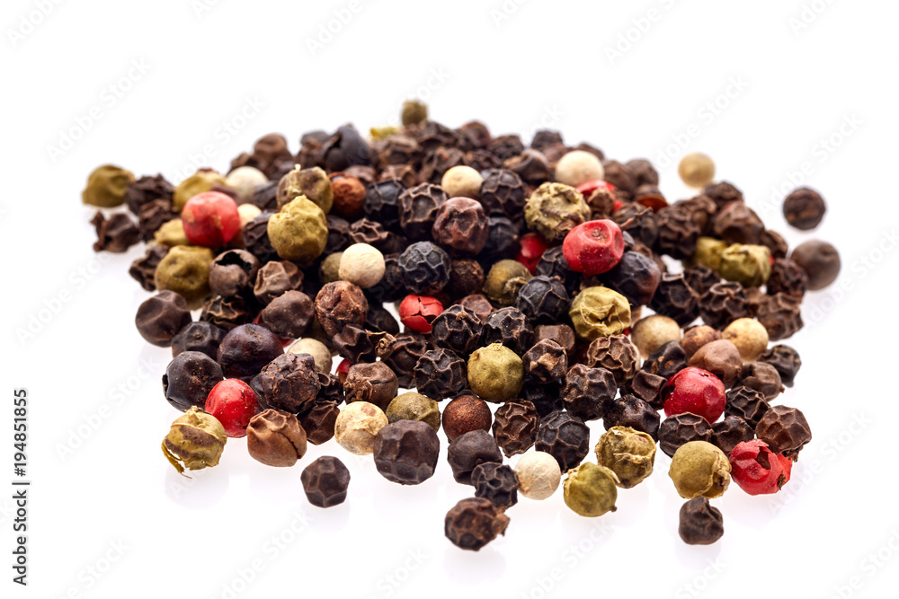 Seasoning - four kinds of pepper peas - isolated on white background Seasoning - four kinds of pepper peas - isolated on white background