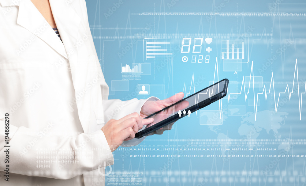 Female doctor with tablet Female doctor with tablet