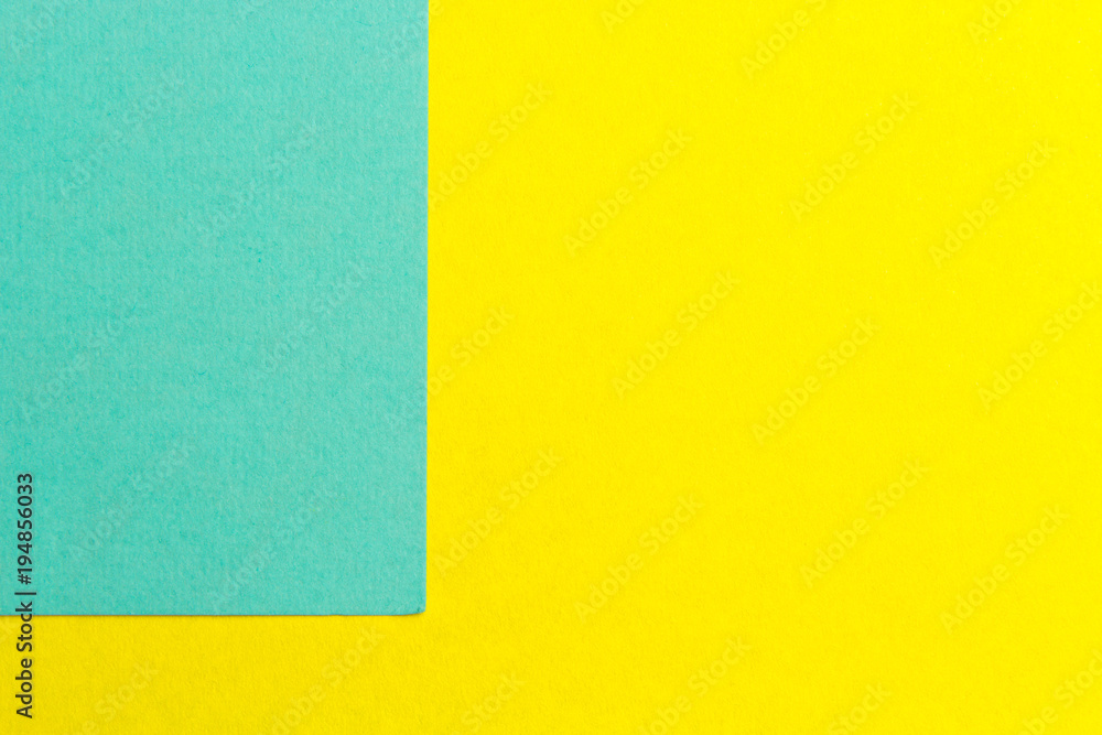 yellow and turquoise paper texture background Color. Trending colors, geometric background of the paper. Colorful soft paper background.Pastel color. yellow and turquoise paper texture background Color. Trending colors, geometric background of the paper. Colorful soft paper background.Pastel color.