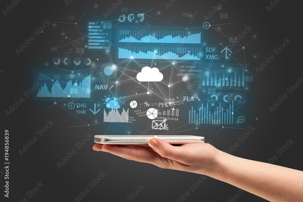Hand using phone with application icons flying around Hand using phone with application icons flying around
