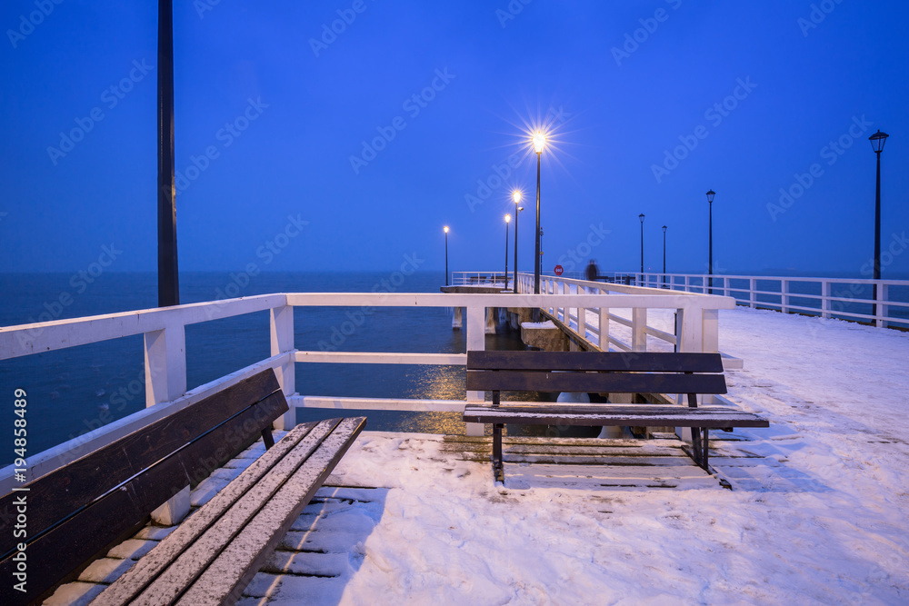 Naklejka premium Snowy pier at Baltic Sea in Gdansk, Poland