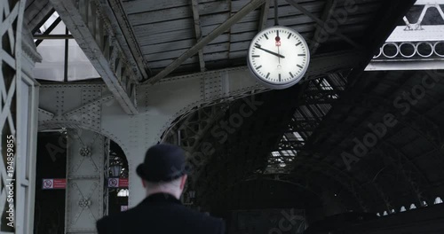 Man going in old station