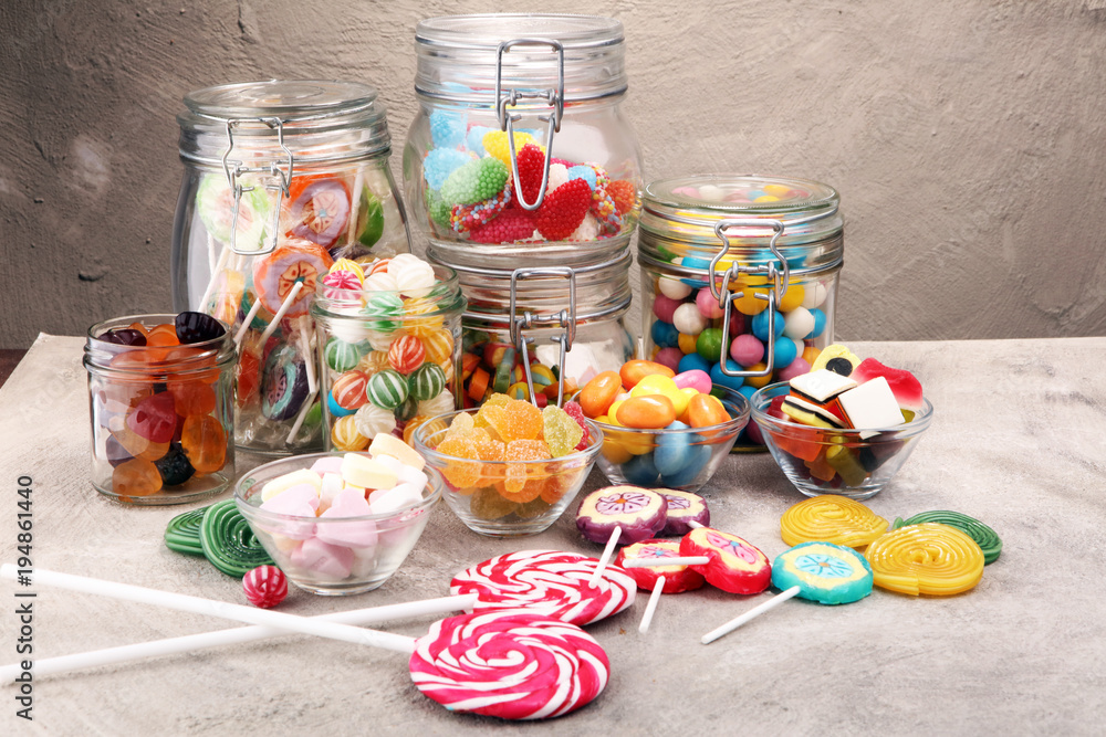 candies with jelly and sugar. colorful array of different childs sweets and treats. candies with jelly and sugar. colorful array of different childs sweets and treats.