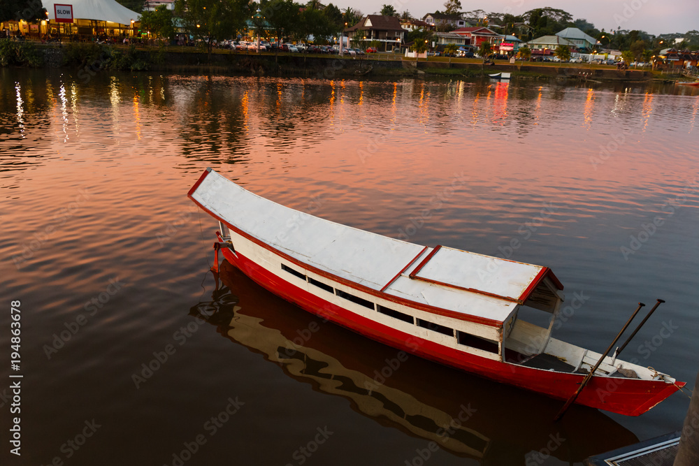 traditional wooden boat on the Sarawak River