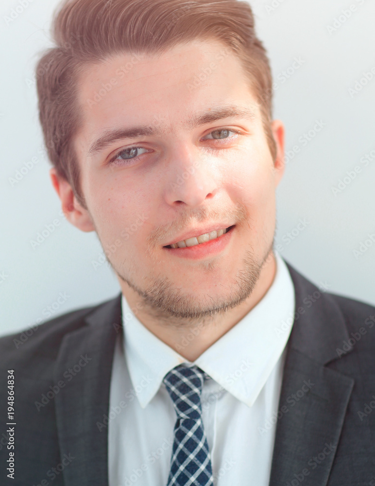 closeup.the face of a successful young man closeup.the face of a successful young man
