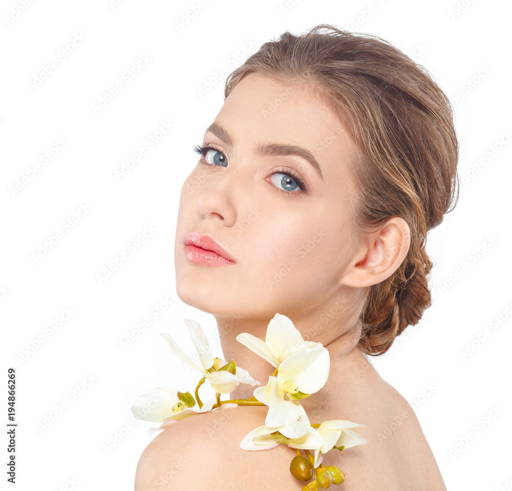 Beauty face of the young beautiful woman with flower Beauty face of the young beautiful woman with flower