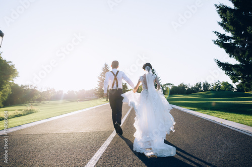 A summer walk of the newlyweds in nature.