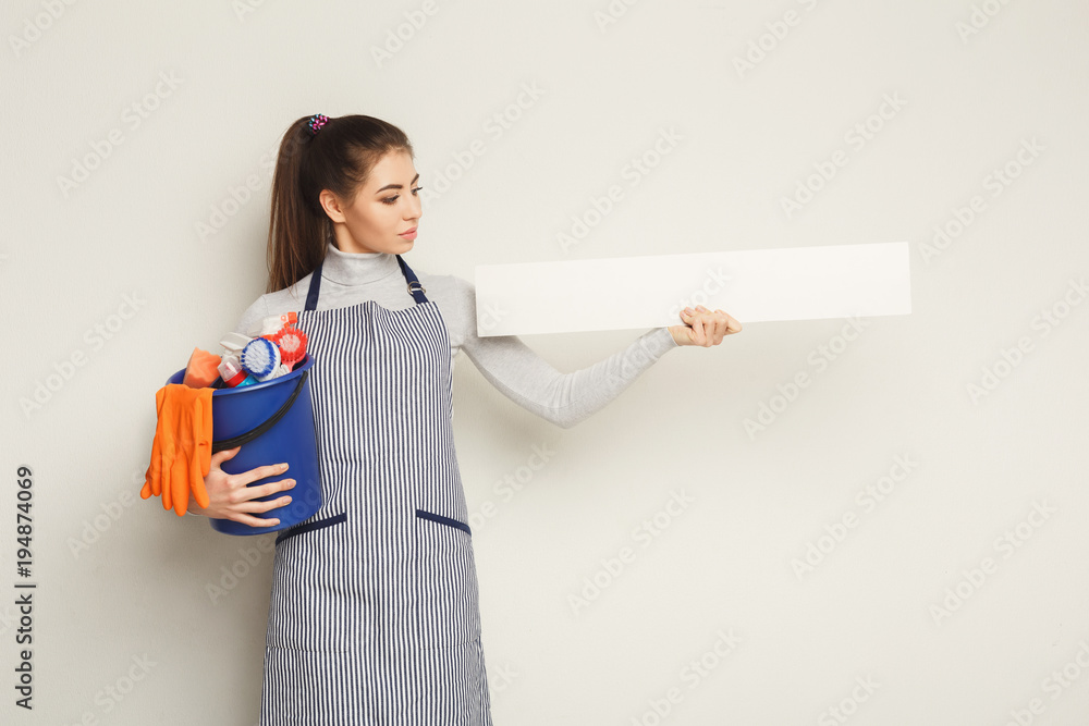 Cleaning service woman presenting a blank board Cleaning service woman presenting a blank board