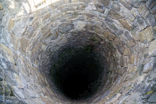 Deep water well in the town, inside. Slovakia