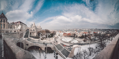 Budapest panorama. Fisherman's bastion in Buda castle, historical part of town, complex of the Hungarian kings. Aerial view of Budapest, Hungary. Hungarian Parliament and Danube river in background. 