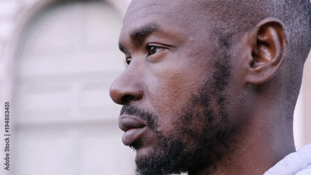 Day dreaming young black african man - profile Day dreaming young black african man - profile