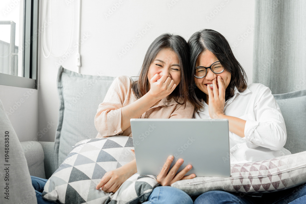 Happy woman best friends using digital tablet Happy woman best friends using digital tablet