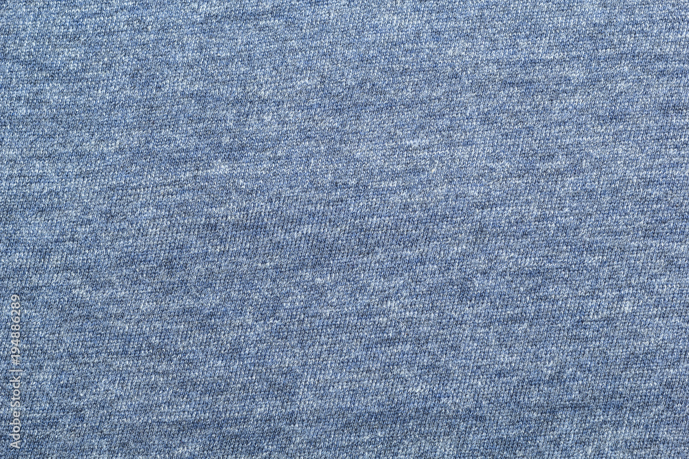 The texture of the fabric is a blue hue. The texture of the fabric is a blue hue.