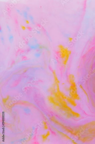 Abstract multicolored background, pink watercolor pattern, colored holographic stains on liquid, texture of pop art, minimalistic background for designer, holographic paint in liquid