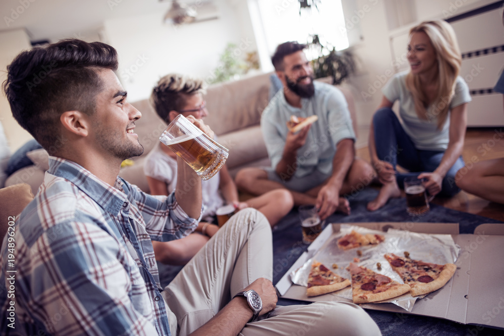 Friends eating pizza and having fun. Friends eating pizza and having fun.