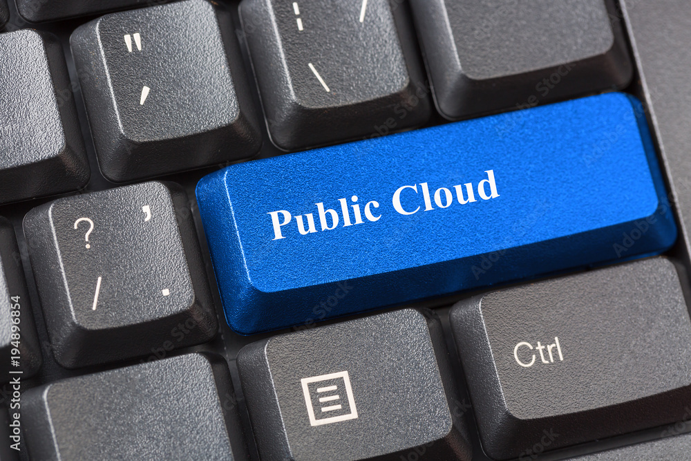 Blue colored Public Cloud button on black computer keyboard. Public cloud services offered by providers concept. Blue colored Public Cloud button on black computer keyboard. Public cloud services offered by providers concept.