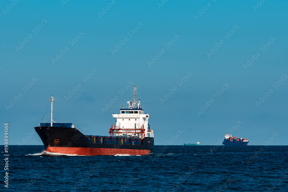Fototapeta premium Black cargo ship