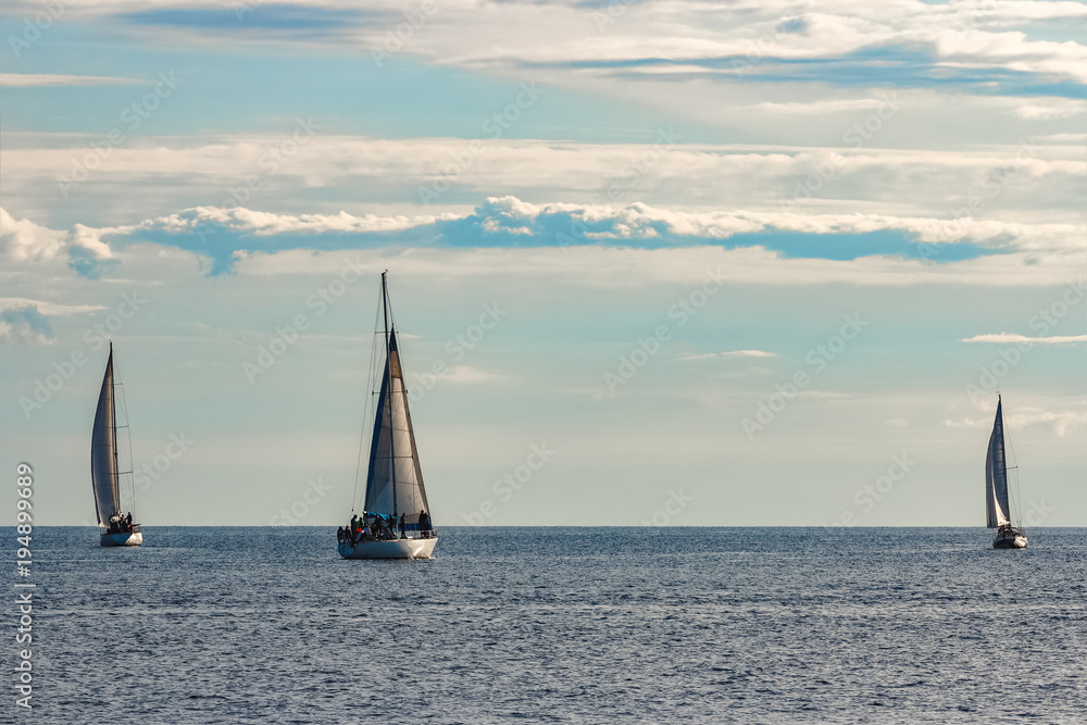 Sailboats traveling by Baltic sea Sailboats traveling by Baltic sea