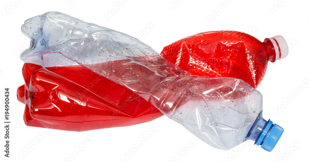 Used plastic bottles in red and blue color. Two empty beverage packages