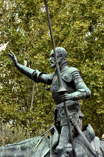 Don quijote en monumento en la plaza de españa photo