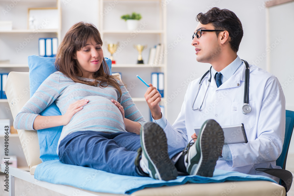 Pregnant woman visiting doctor for consultation Pregnant woman visiting doctor for consultation