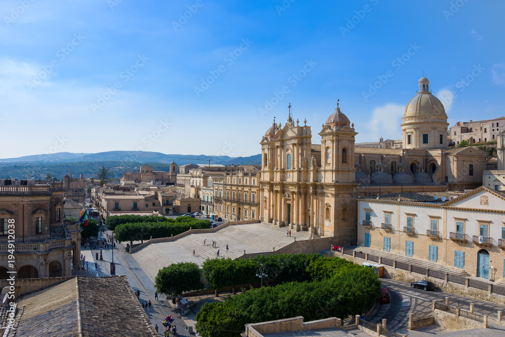 View of the baroque cathedral, town hall and the main street of Noto