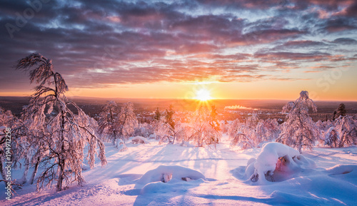 Winter wonderland landscape in Scandinavia at sunset