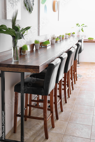 Modern cafe interior with w...