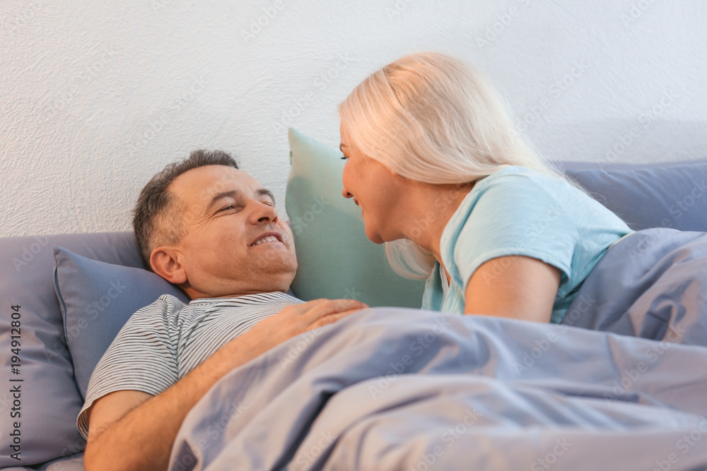 Senior couple in bed together Senior couple in bed together