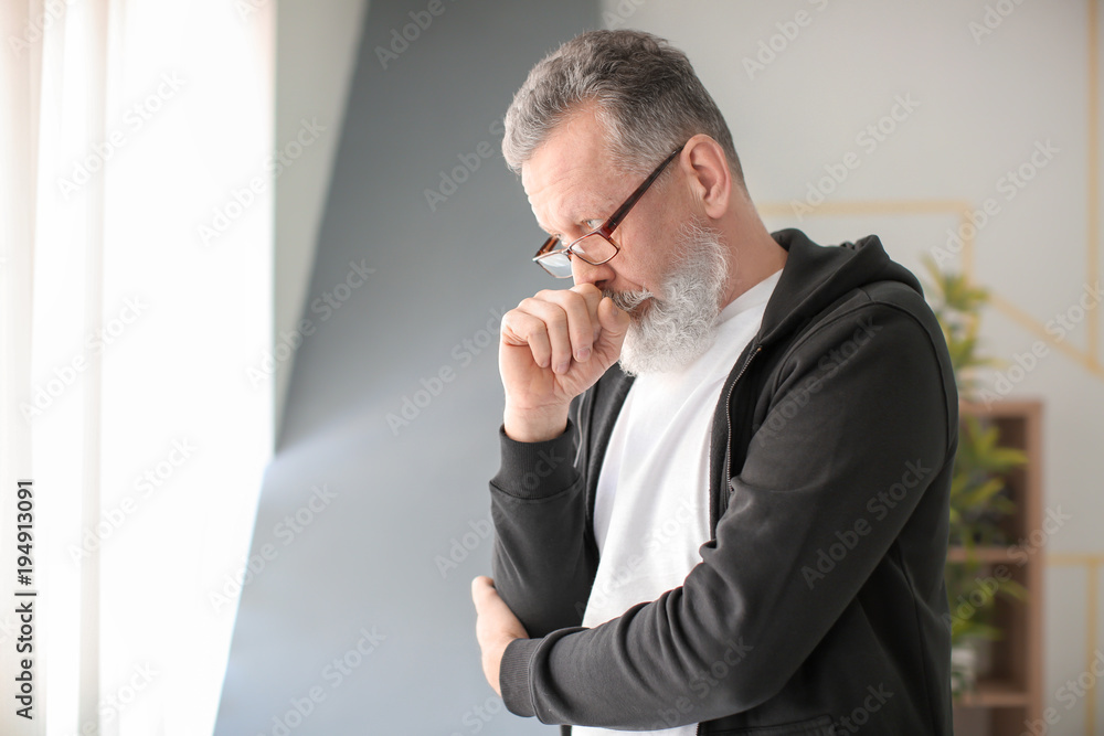 Portrait of senior man in casual clothes indoors Portrait of senior man in casual clothes indoors